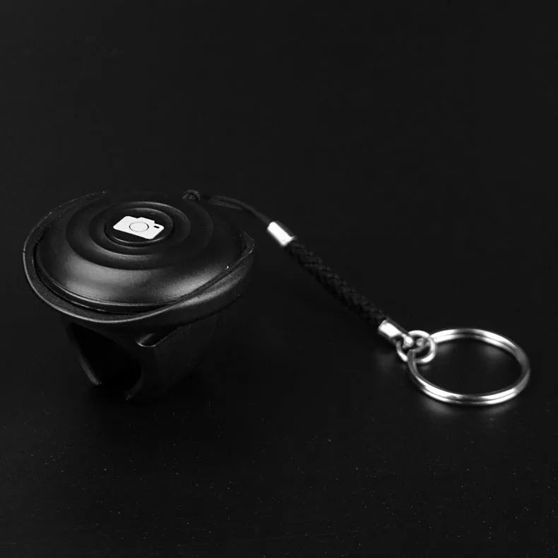 Black Bluetooth selfie remote control for wireless photography with 10m range