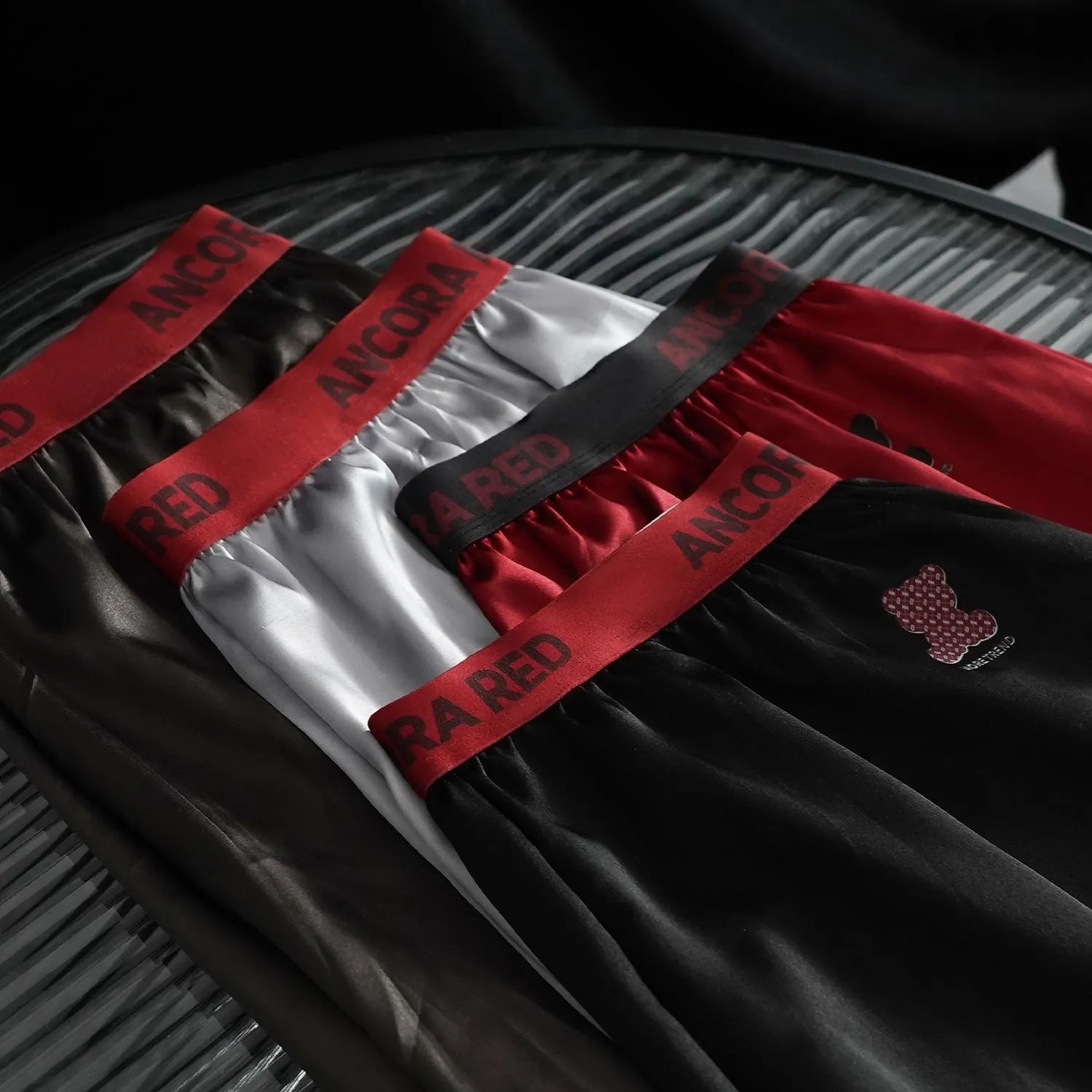 Men's solid colour boxer briefs on a white background showing mid waist design.