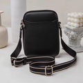 Solid colour small crossbody shoulder bag in PU leather measuring 14.5cm by 5.5cm by 19cm