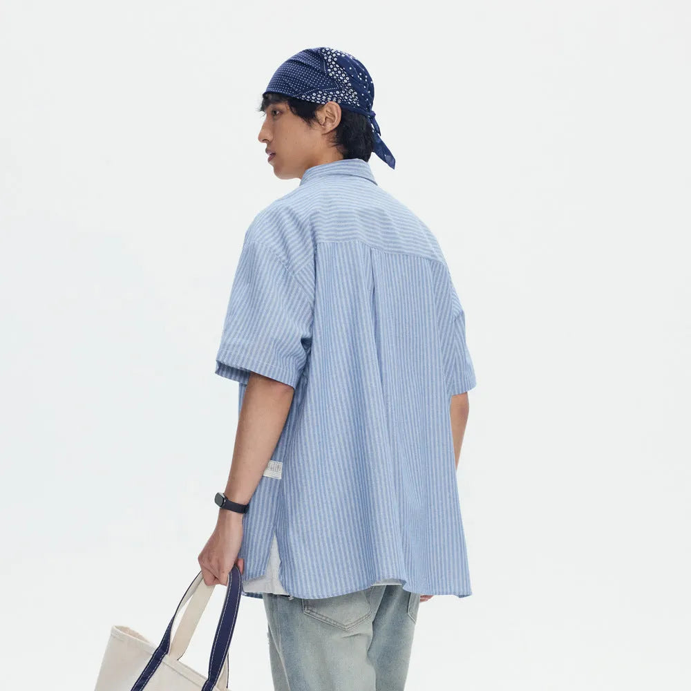 Blue striped overalls shirt with short sleeves and loose cardigan style