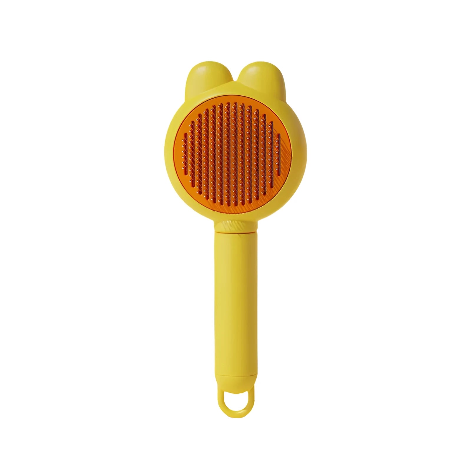 Self-cleaning pet grooming brush with green handle and stainless steel comb, showing the one-click release button.