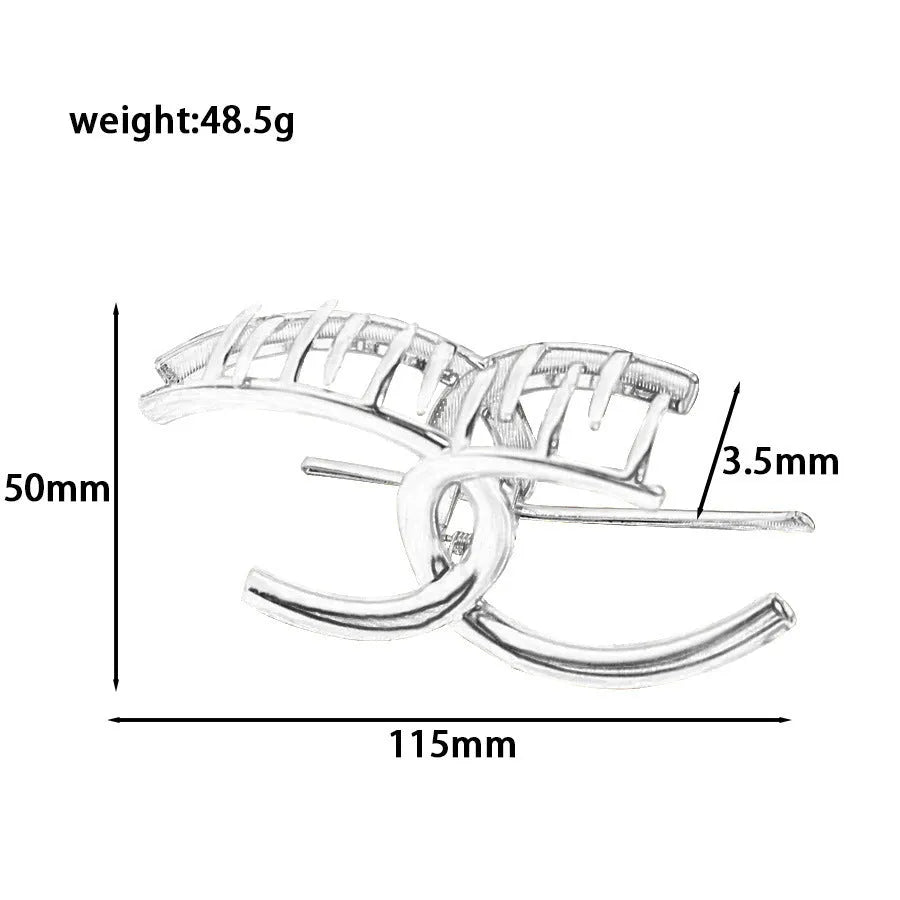 Silver metal hair barrette claw clip with electroplated finish and decorative design