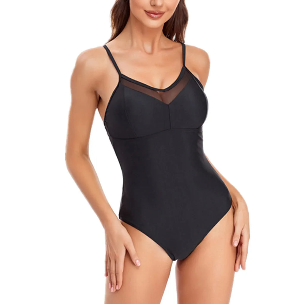 Women's solid colour mesh one-piece swimsuit with backless design in black or blue options