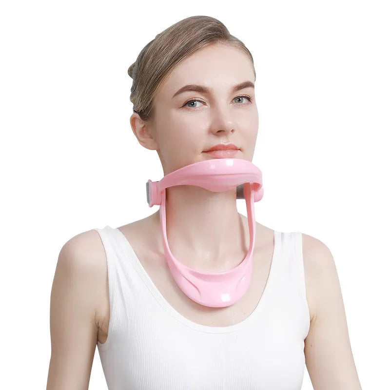 White PP plastic neck and shoulder support brace for posture correction on a grey background.