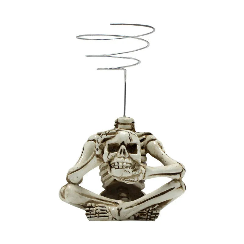 Gothic style resin Tillandsia bracket with skull decoration for air plants, measuring 7cm by 8cm by 12.5cm.