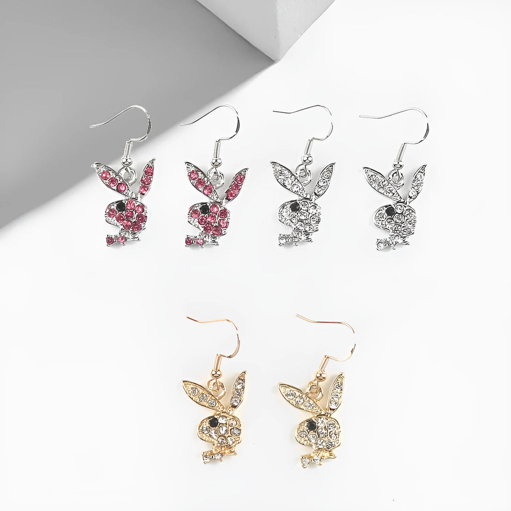 Alloy full diamond rabbit character stud earrings in silver, gold, or pink colour.