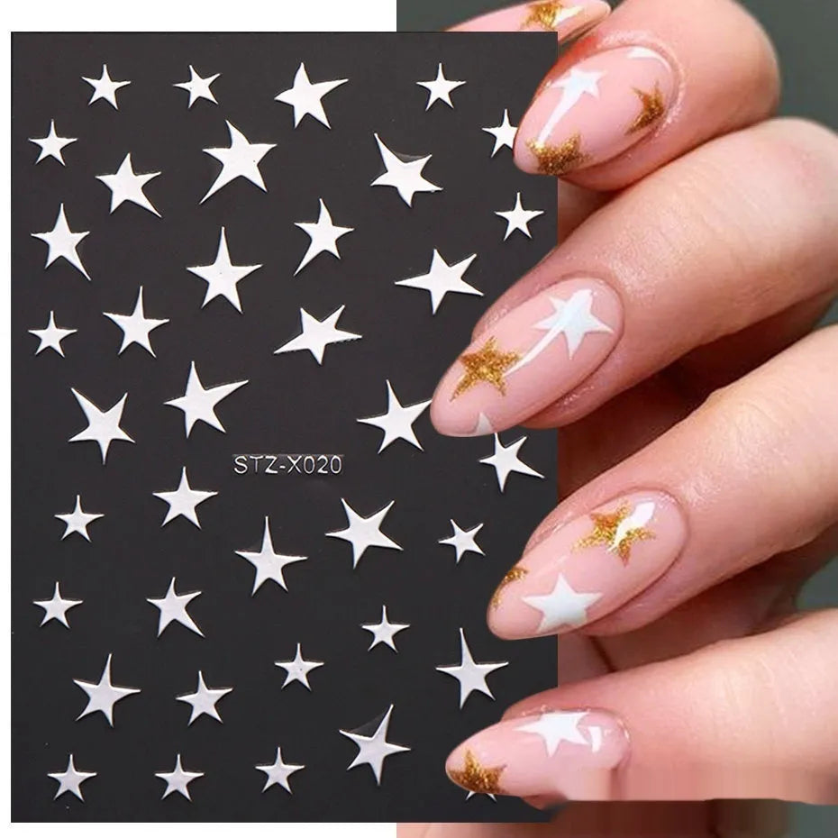Close-up of a cartoon-style nail sticker with black and silver strips and a love pattern design on a fingernail.