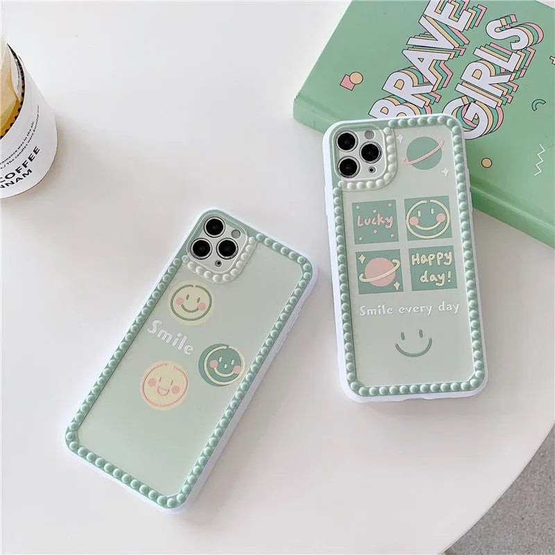 Green TPU iPhone case with polka dot frame and colourful smiley face geometry patterns