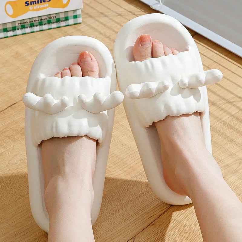 Women's deer horn design flip flop slippers in EVA material, shown in light yellow colour.