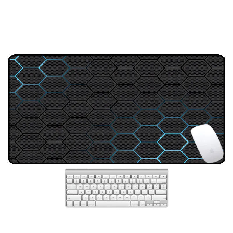 Large thermal transfer printed mouse pad with natural rubber non-slip base on a desk.