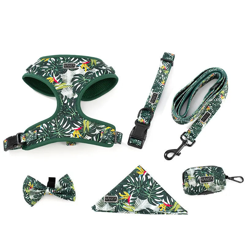 Six-piece cloth dog harness set with chest back, leash, collar, waste bag, bow tie, and scarf in various colours