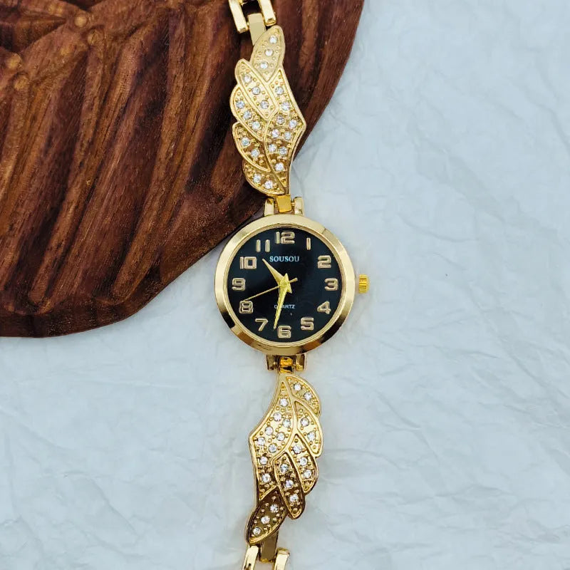 Stainless steel ladies watch with round dial on metal strap with Vachette clasp
