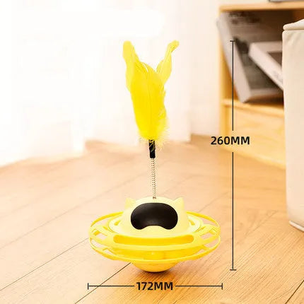 Pink stick-shaped cat toy turntable tumbler with self-hi feature on flat surface