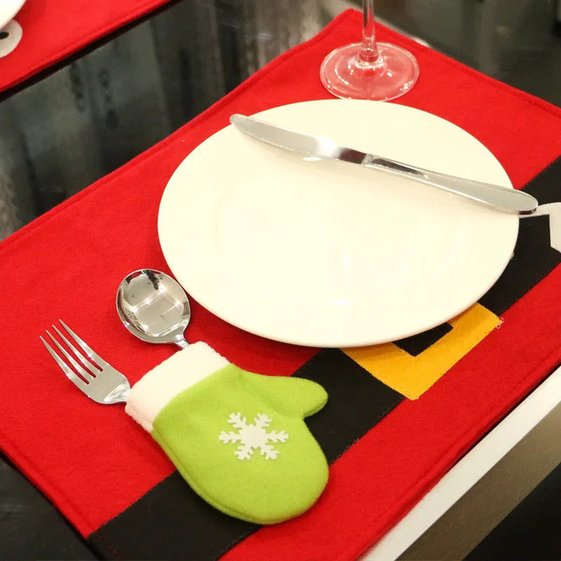 Red brushed fabric Christmas table mat 45 by 33cm on a dining table
