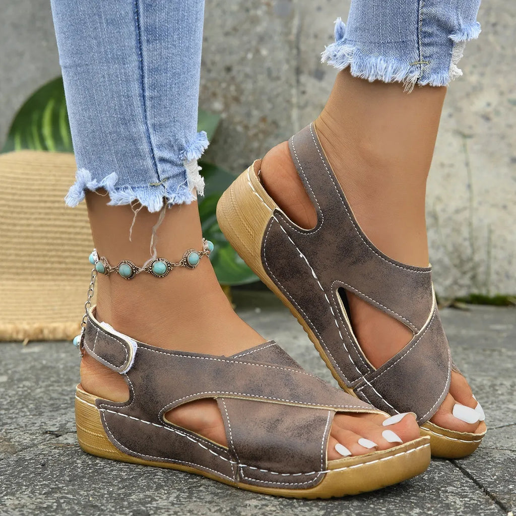 Roman platform sandals with skirt detail and Velcro fastening in neutral colours