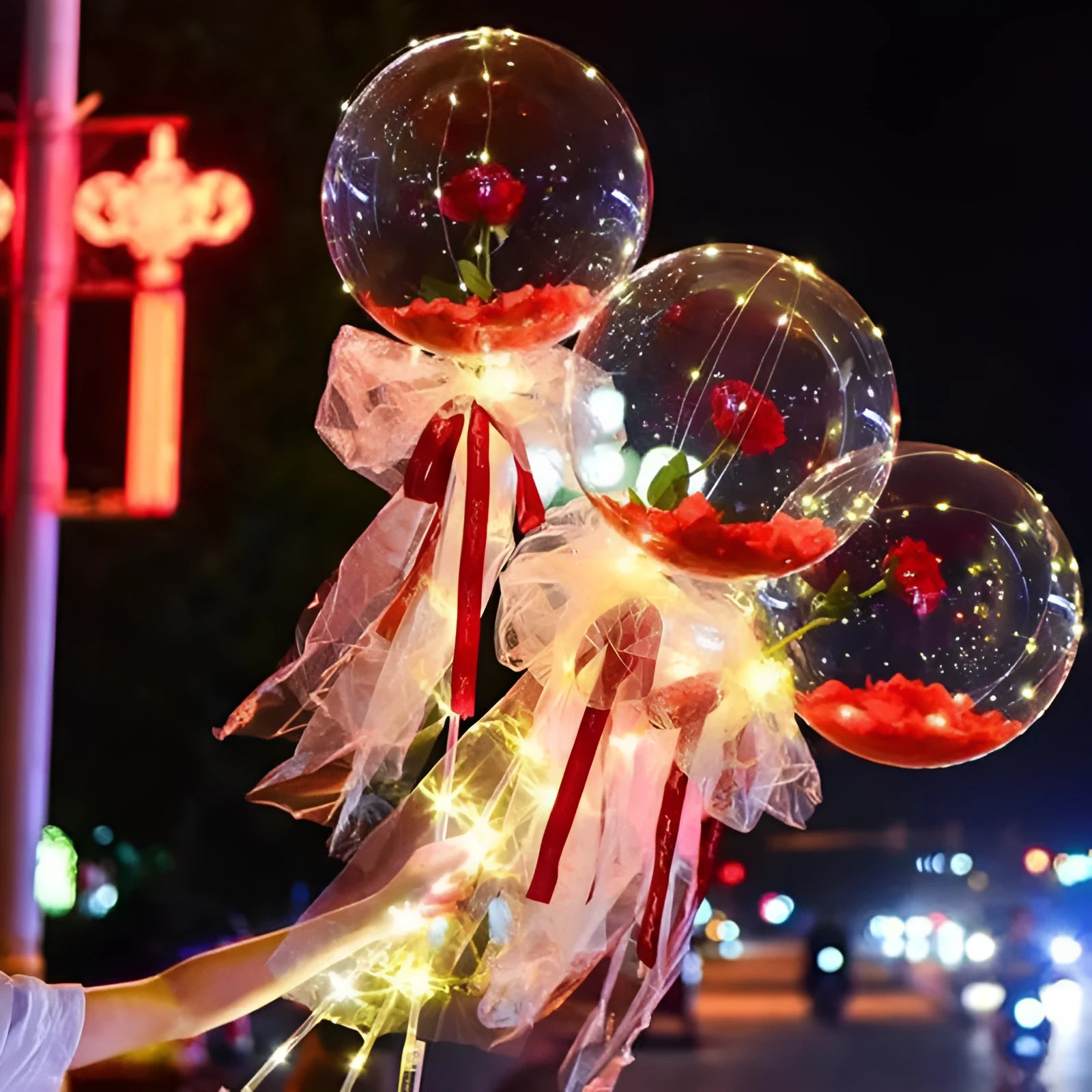 Transparent LED luminous DIY balloon rose bouquet with integrated lights for decoration.