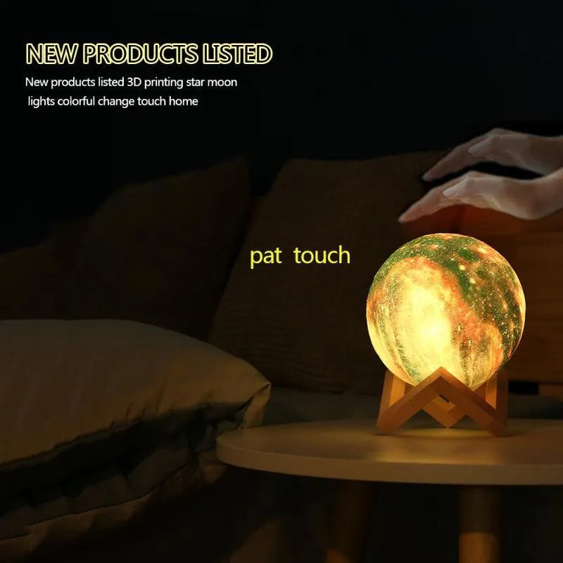 3D-printed spherical lunar night light with remote control on wooden table