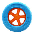 Set of three floating TPR dog toys: a blue ball, an orange barbell, and green tyres on a pool edge.