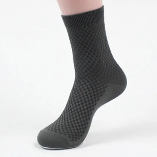 Men's bamboo fibre socks showing small square pattern in one of five available colours.