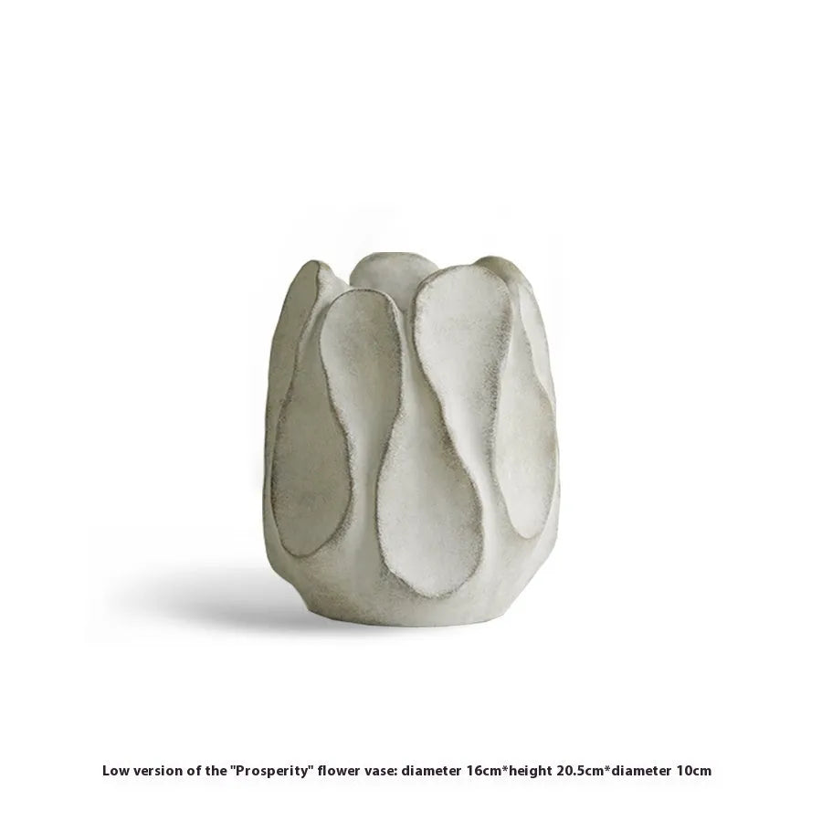 Irregular ceramic art vase in magnesium clay with resin decorative elements for floral arrangements