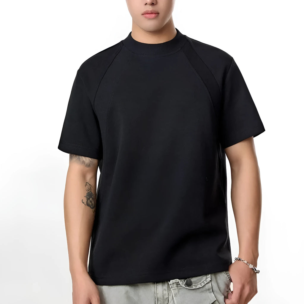 Short sleeve polyester top with textured air layer stitching in a loose fit.