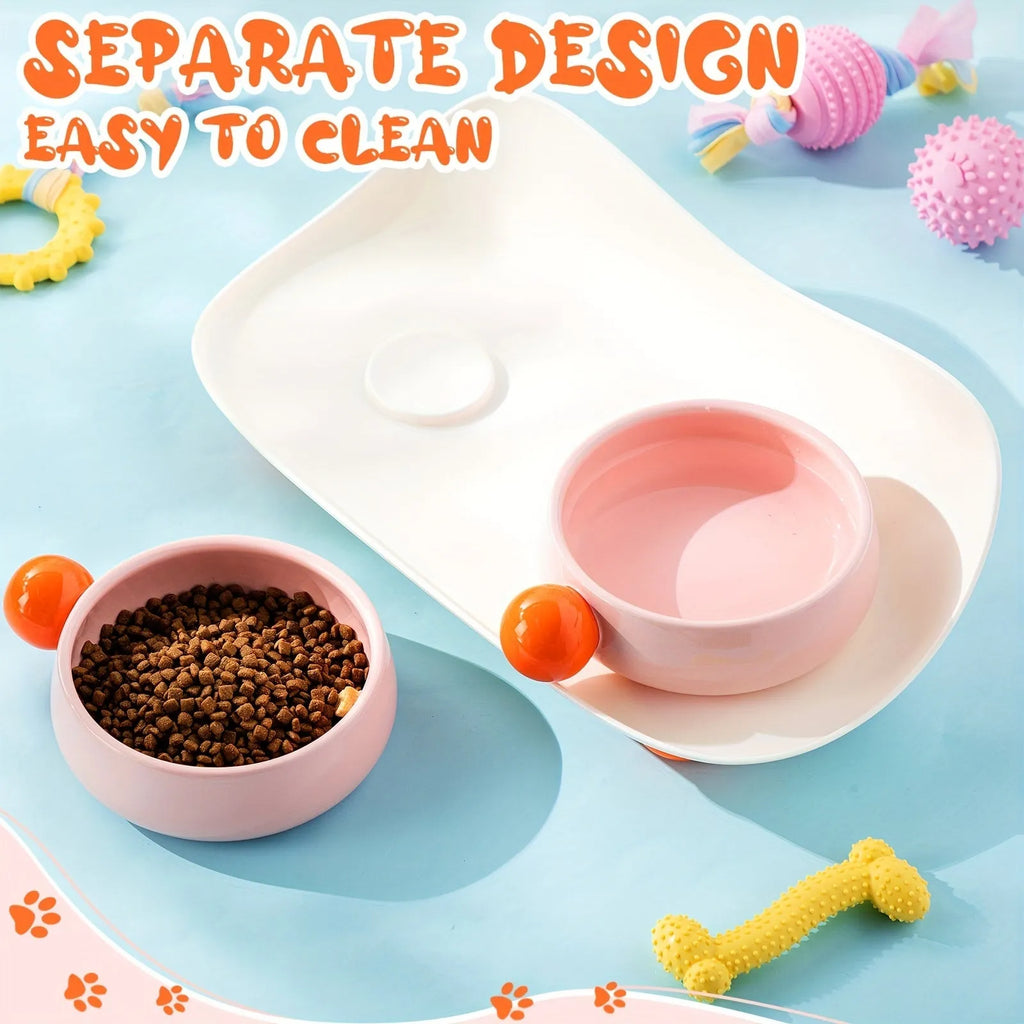 Double raised ceramic pet feeding bowl set with non-slip base in pink colour