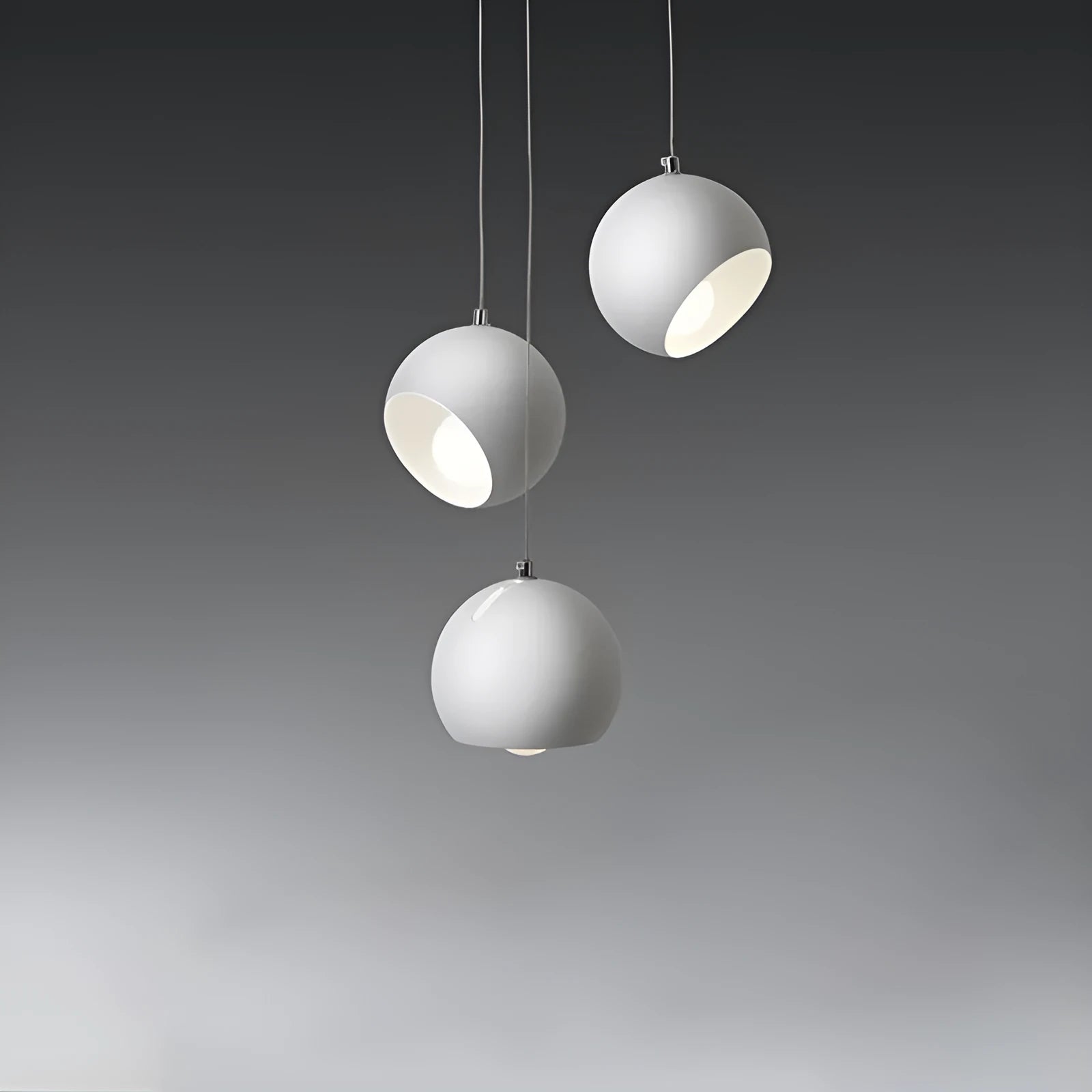 Post-modern ball chandelier table lamp in Moon White or Obsidian Black finish.