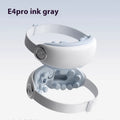 Purplish grey rechargeable Bluetooth eye steam massager and hot compress device on a plain background.