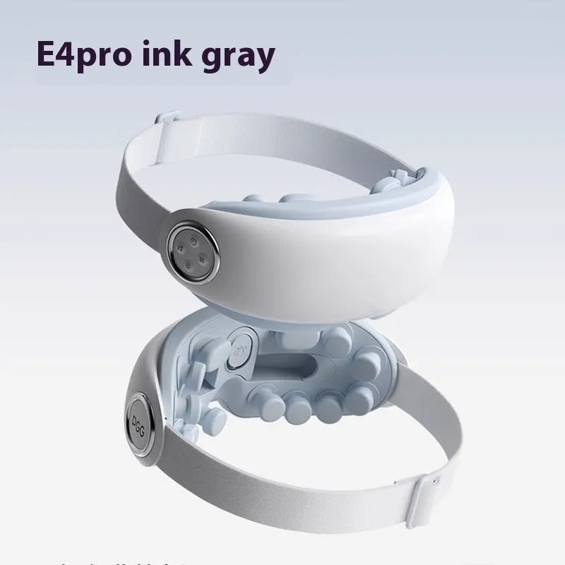 Purplish grey rechargeable Bluetooth eye steam massager and hot compress device on a plain background.