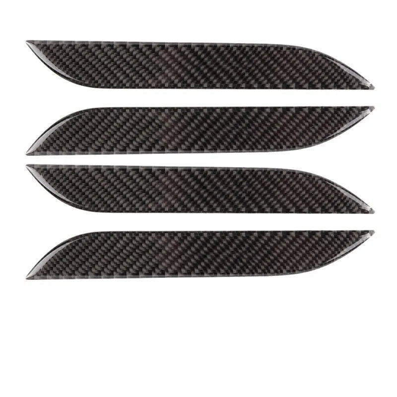 Carbon fibre door handle protective stickers for Tesla Model S, showing adhesive drip pattern.