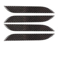 Carbon fibre door handle protective stickers for Tesla Model S, showing adhesive drip pattern.