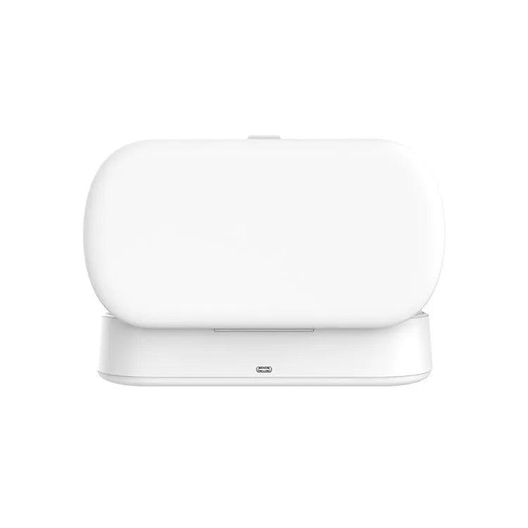 White ABS UV steriliser and wireless charging box for mobile phones and toothbrushes.
