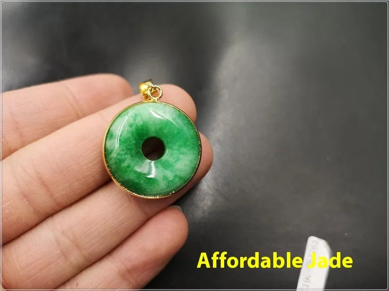 Green jade water drop pendant with white background gray jade and safety buckle