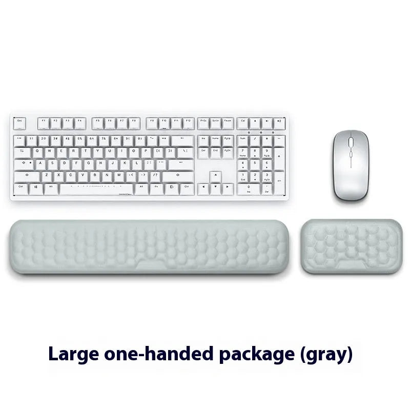 Memory foam mouse wrist rest pad with silicone base in black cloth cover option on desk