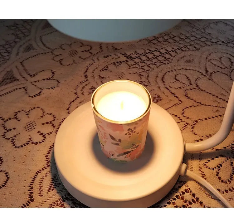 White European romantic style aromatherapy wax melt lamp with dimmer switch on a table.