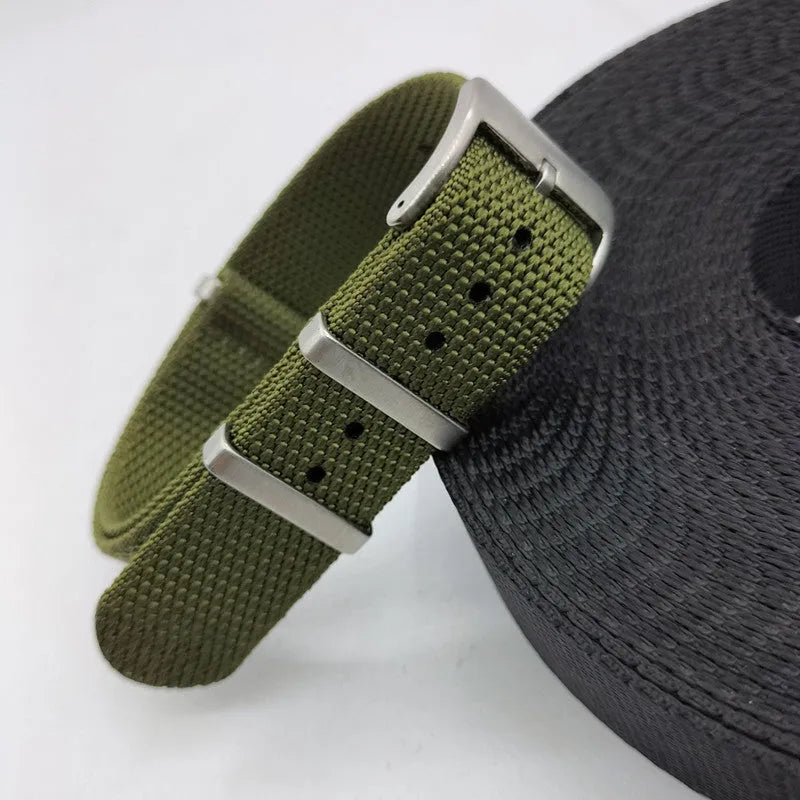 Nylon integrated watch strap in military colours showing 20mm and 22mm width options