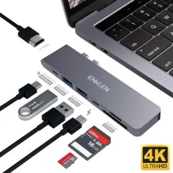 Compact aluminium USB-C hub adapter with SD card slot, microSD slot, two USB ports, HDMI, and charging port.