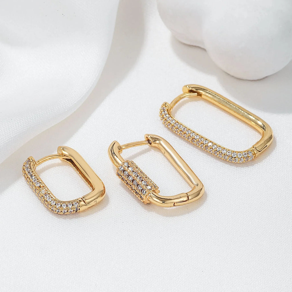 Copper geometric earring set with three square ear clips featuring inlaid zircon stones