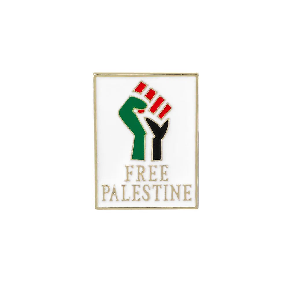 Square corrugated alloy brooch with Palestinian flag design on a neutral background