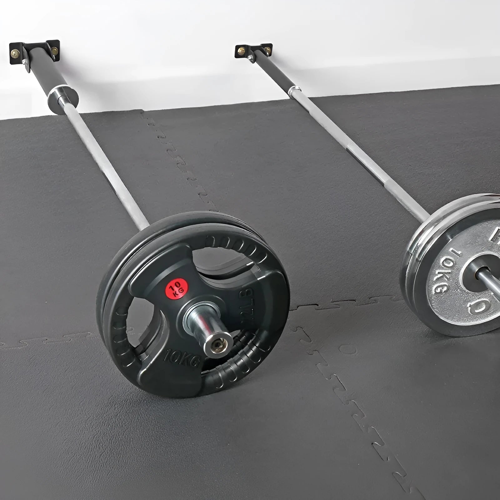 Steel wall-mounted barbell rod rack holding multiple tubes, with expansion screws for installation.
