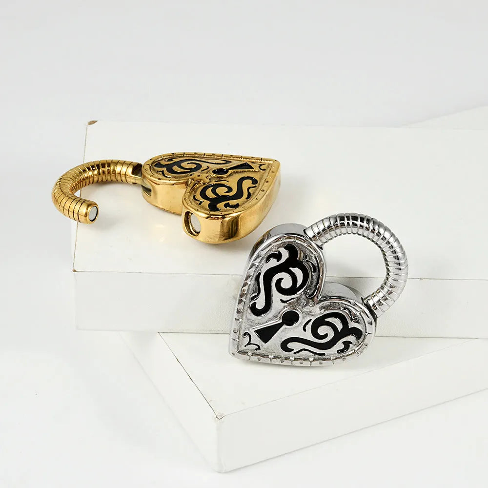 Women's heart-shaped stainless steel earrings in gold and steel colour options