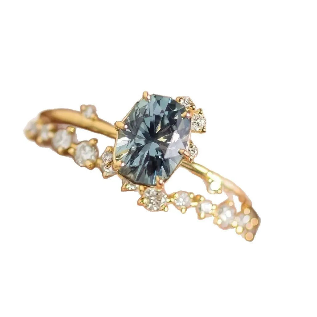 Gold plated floral ring with green zircon stones in women's fashion jewellery design