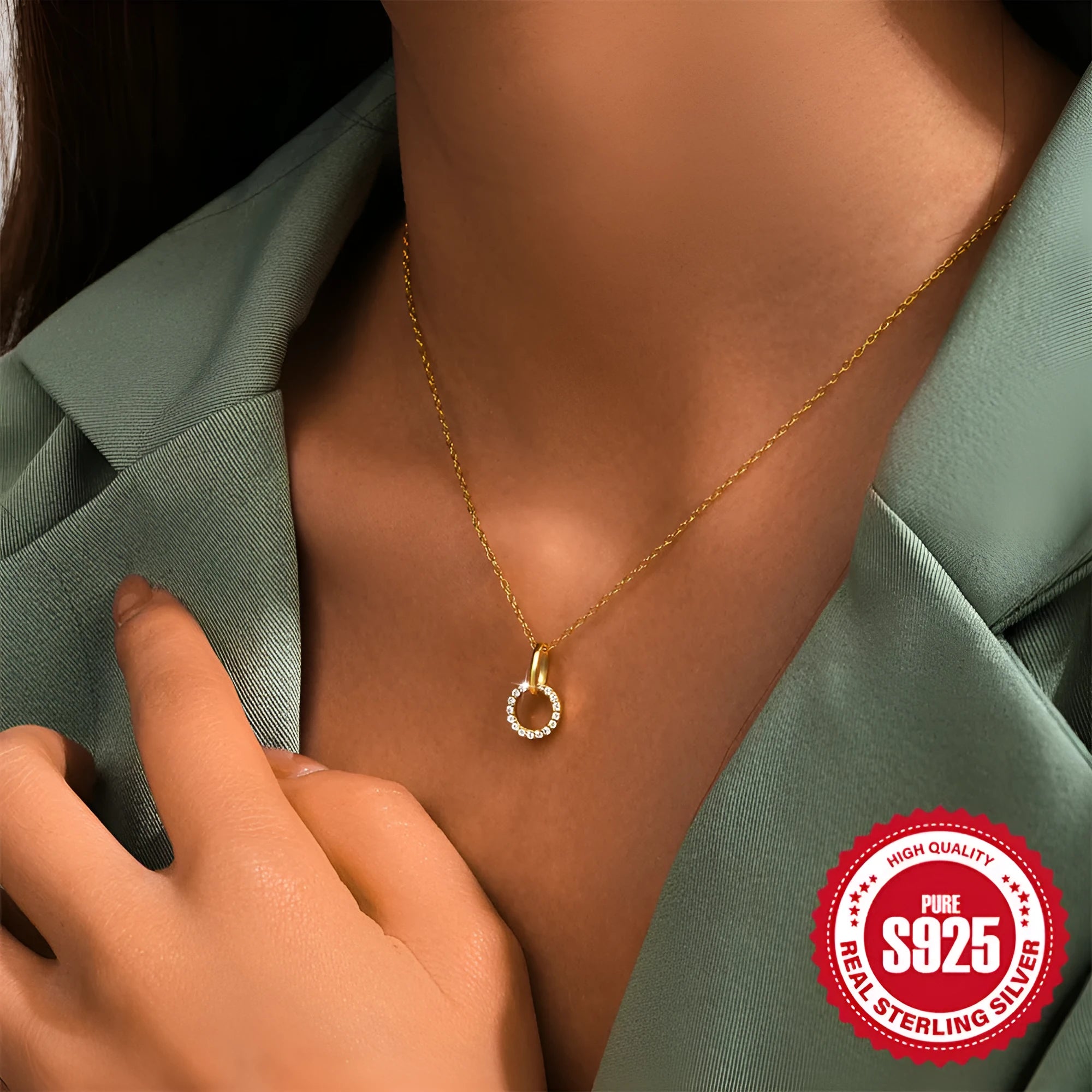 Gold-colour sterling silver necklace with geometric zircon pendant on an adjustable clavicle chain.