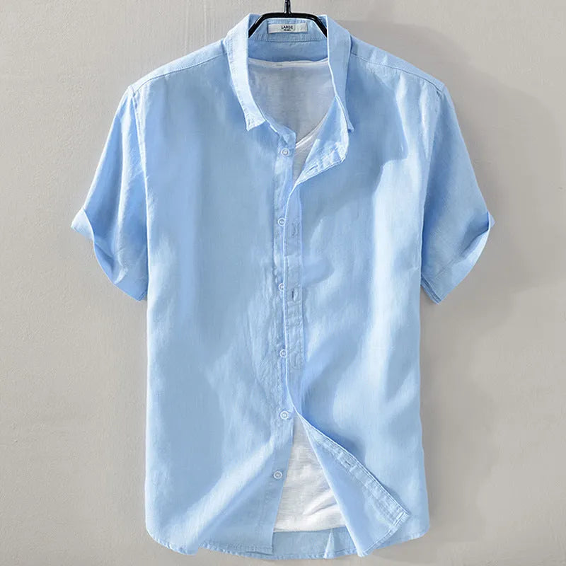 Men's loose fit short sleeve linen shirt in a cotton and linen blend, shown in apricot colour.