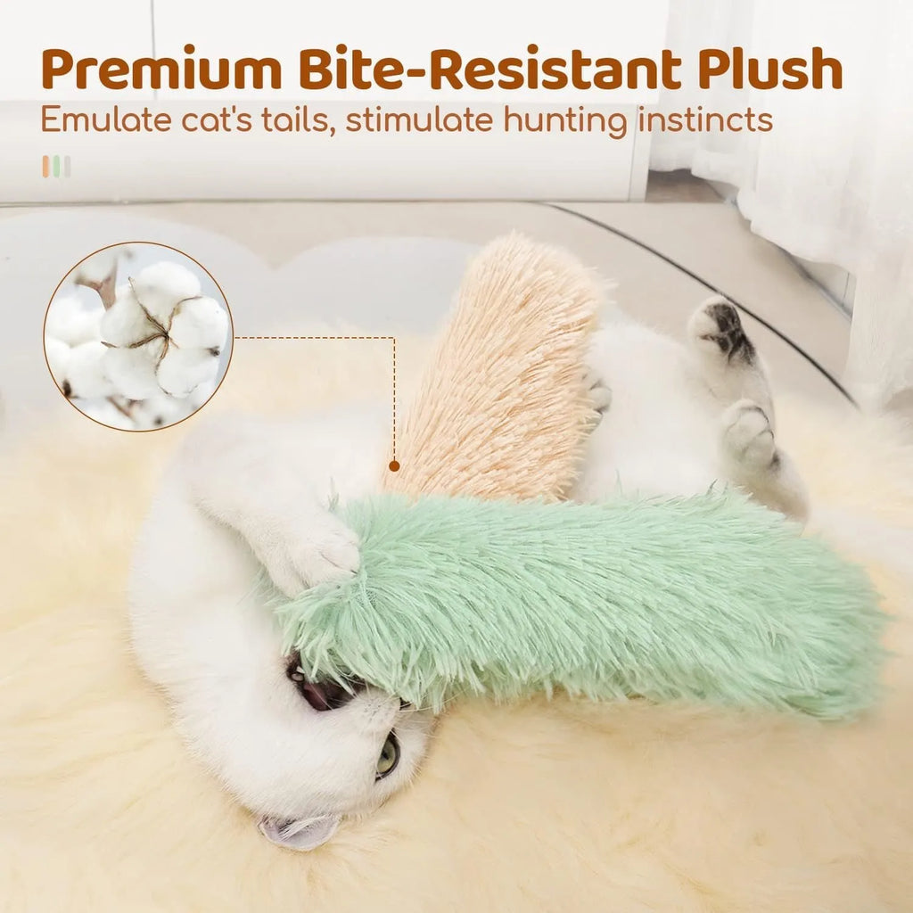 Soft plush cat toy pillow in blue, green, pink, or white, measuring 27 by 10 centimetres.