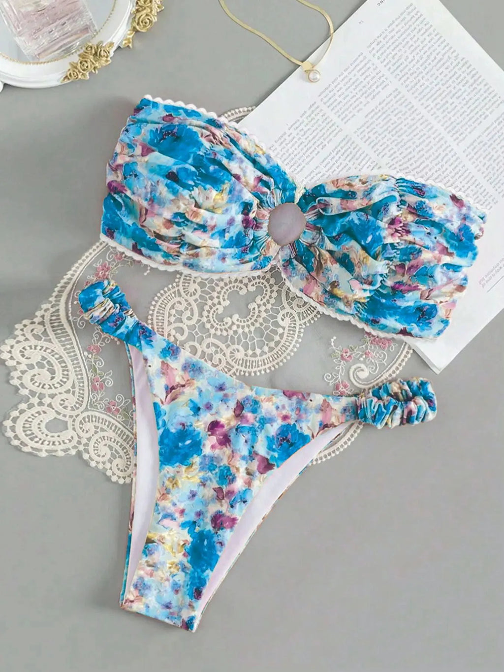 Women's floral print tube top bikini set with lace trim in blue colour