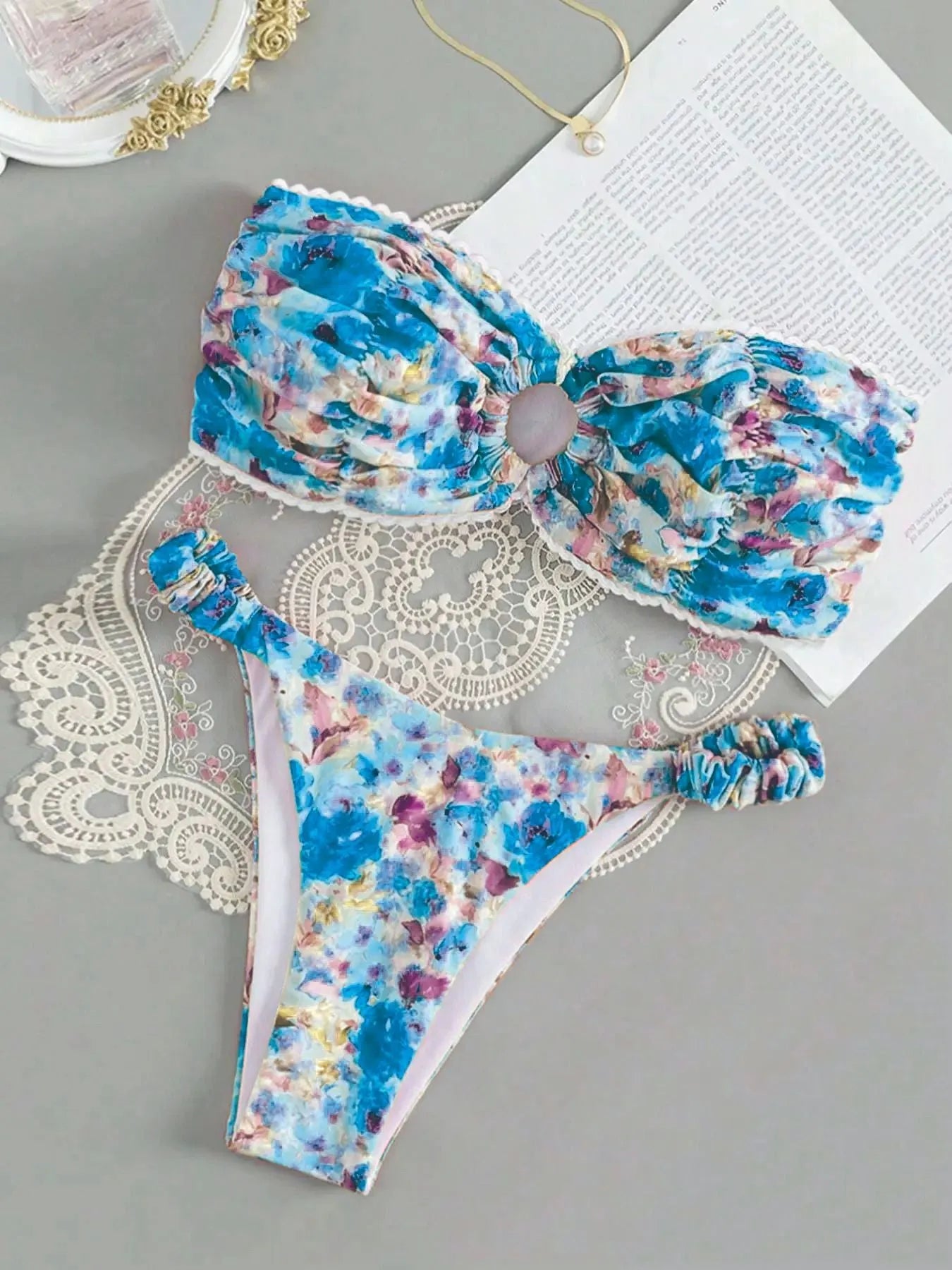 Women's floral print tube top bikini set with lace trim in blue colour