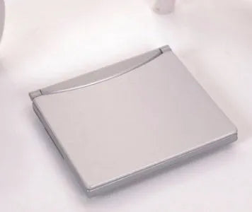 Square folding travel alarm clock with perpetual calendar and mirror front in closed and open positions showing plastic case