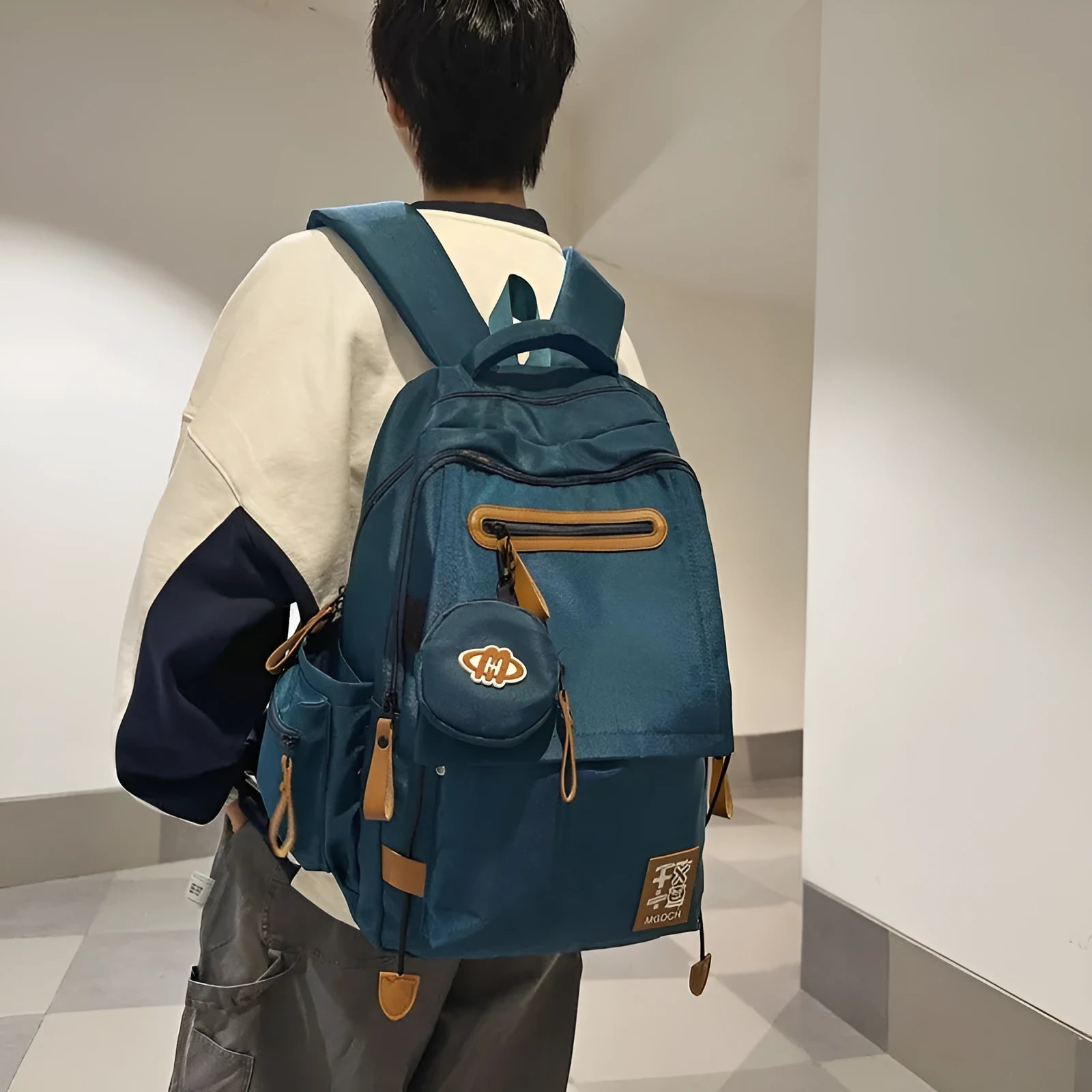 Large nylon backpack for middle school students with curved shoulder straps in solid colour options