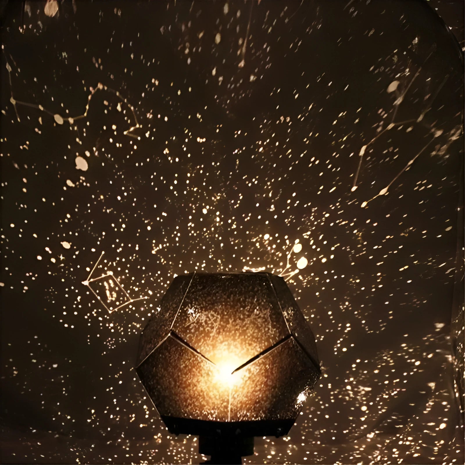LED star projector showing constellation projection on bedroom ceiling with remote control